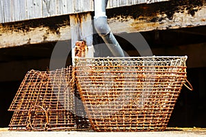 stack of old lobster traps rusty