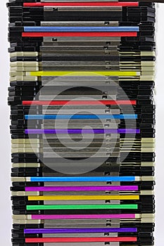 stack of old magnetic floppy disks used to save data from the first personal computers