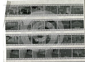 Stack of old negative photographic films in a sheet of parchment