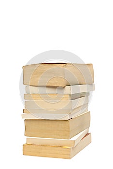 Stack of old paperback books isolated with copyspace