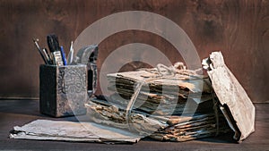 Stack of old papers and books tied with rope