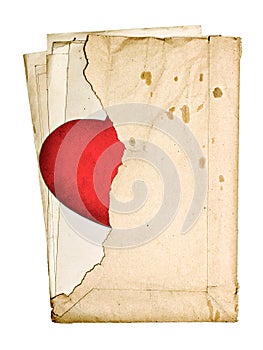 Stack of old papers in a torn envelope