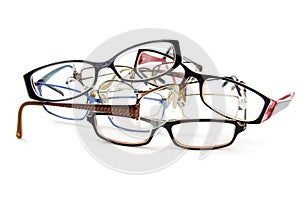 Stack of old reading glasses