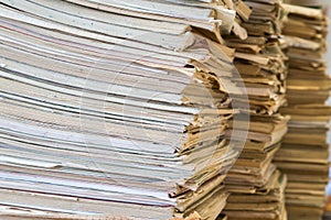 A stack of old school notebooks. Multicolored cover