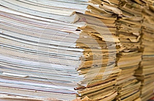 A stack of old school notebooks. Multicolored cover