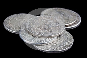 Stack of old vintage silver medieval taller coins photo