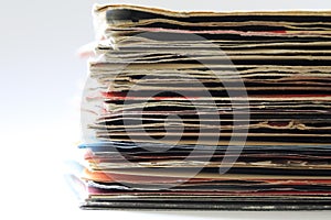 Stack of old vinyl singles in original sleeves