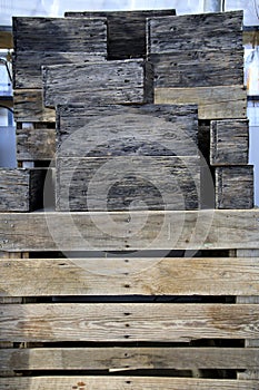 Stack of old wooden boxes on top of each other