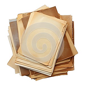 A stack of old, yellowed papers with a worn, aged appearance
