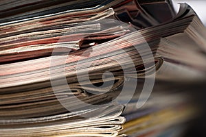 Stack of older colored magazines