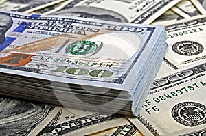 Stack of one hundred dollar bills