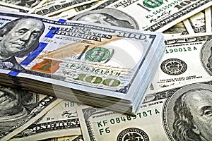 Stack of one hundred dollar bills