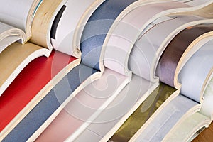 Stack of open magazines