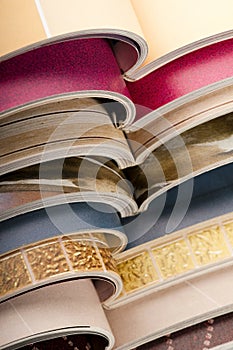 Stack of open magazines