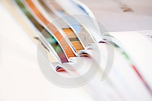 Stack of open magazines - shallow dof