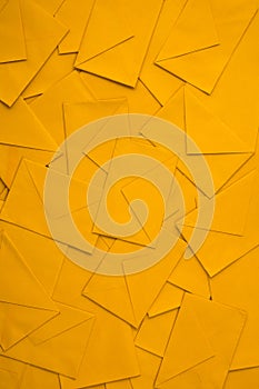 Stack of orange envelopes, background abstract