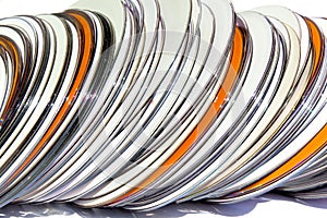 Stack of Orange and White Compact Discs