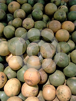 stack oranges at the minimarket