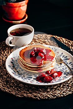 Stack of pancakes with dogberry jam