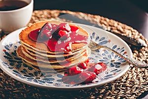 Stack of pancakes with dogberry jam