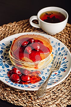 Stack of pancakes with dogberry jam