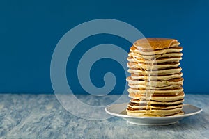 Stack of pancakes with hone