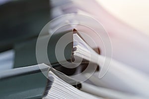Stack of Paper documents with clip, Pile of unfinished documents on office desk folders. Business papers for Annual Report files,