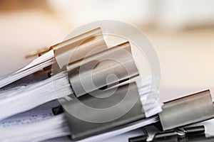 Stack of Paper documents with clip, Pile of unfinished documents on office desk folders. Business papers for Annual Report files,