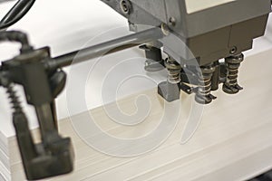 Stack of paper on an offset press