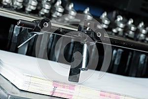 Stack paper on a printing press