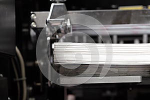 Stack of paper in a printing press