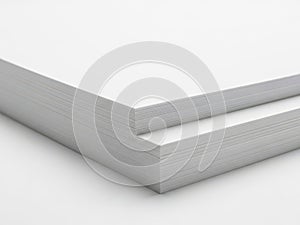 Stack of paper sheets isolated on white background