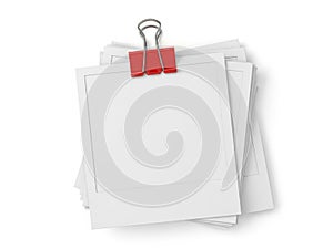Stack of papers with clip isolated on white background