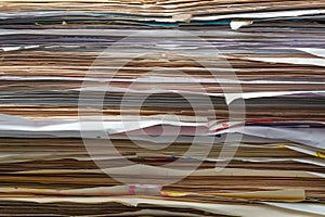 stack of papers or documents abstract in close-up view