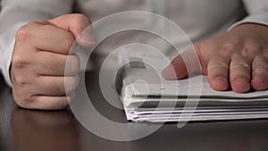 Stack of Papers and Fist Men. Businessman Gets Stress and Nervous Breakdown at Work. Man Shows Aggression At Work And