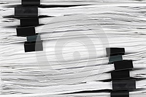 Stack of papers with paper clips, office folders. Background, texture