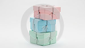 Stack of pastel colored gift boxes isolated on white background