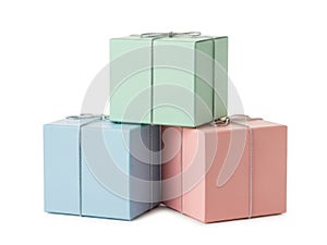 Stack of pastel-colored gift boxes with string bows