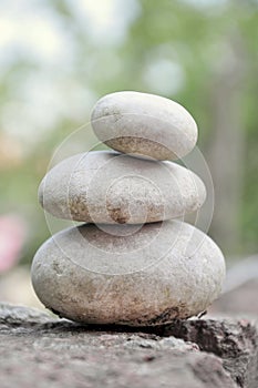 Stack of pebble stones on balance
