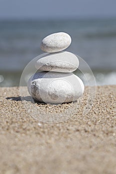 Stack of pebble stones on balance on beach