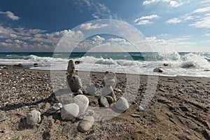 Stack of pebbles balancing on a beach