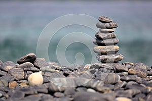 Stack of pebbles on beach, Koh Hin Ngam, Andaman Sea, in Tarutao Marine National Park, Satun, Thailand