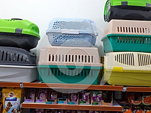 Stack of Pet Carriers On Pet Shop Shelves