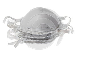 Stack pile of face masks for respiratory protection agains virus and dust. Isolated on white