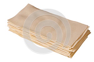 stack pile of sheets of raw lasagna dough isolated on white