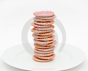 Stack of pink icing cookies