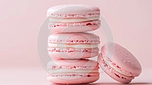 stack of pink macarons on pastel background, sweet dessert concept