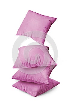 Stack of pink pillows isolated on white background