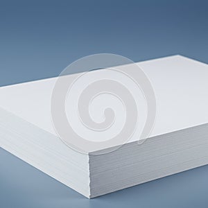Stack of plain white paper sheets with a smooth surface, neatly aligned and resting on
