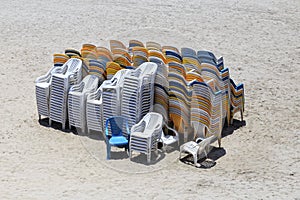 Stack of plastic chair.